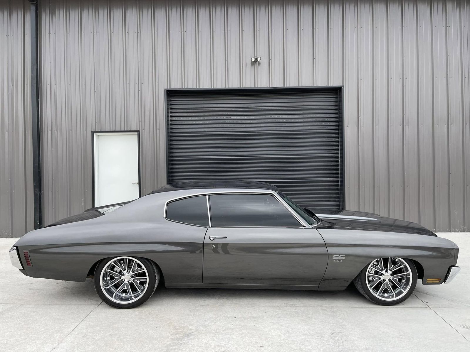 Chevelle in front of the shop